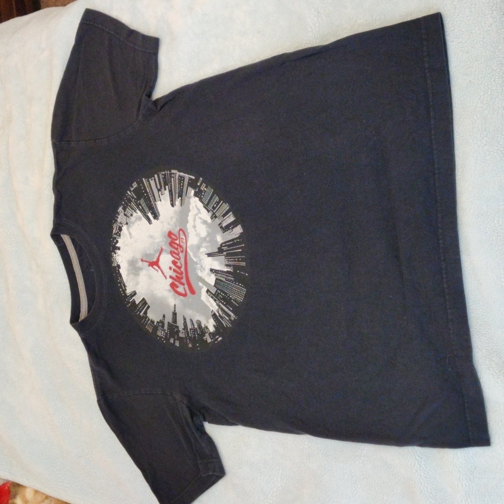 Jordan shirt with Chicago displayed in the middle